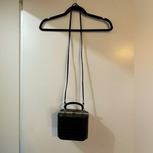 Vintage square, patent leather purse, removable long strap.